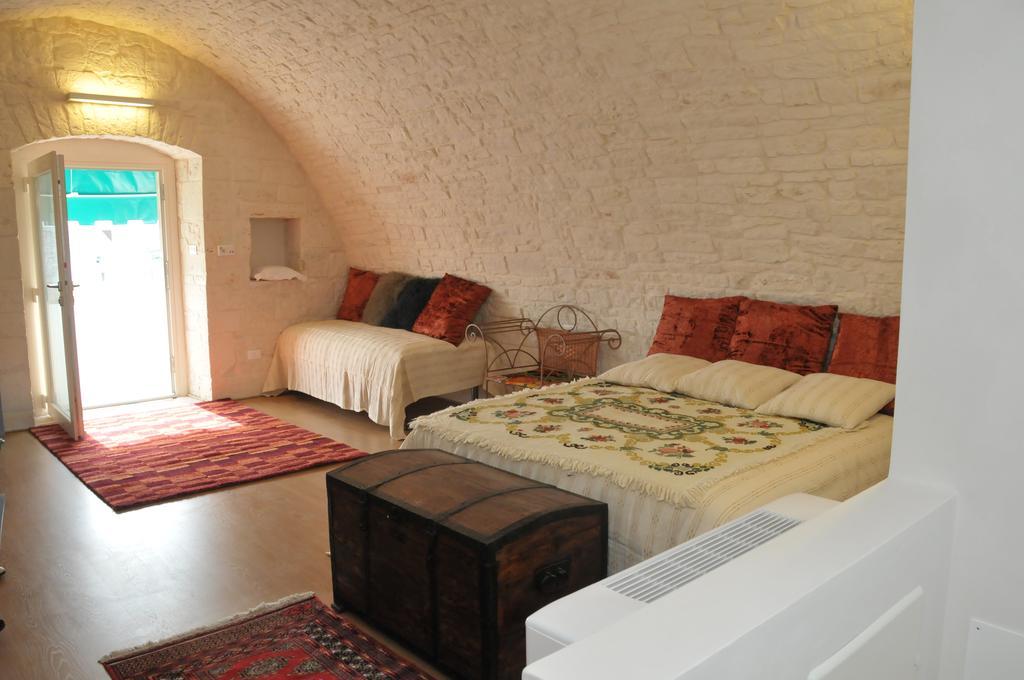 Bed and Breakfast Palazzo Agrusti - Residenza D'Epoca Альберобелло Номер фото